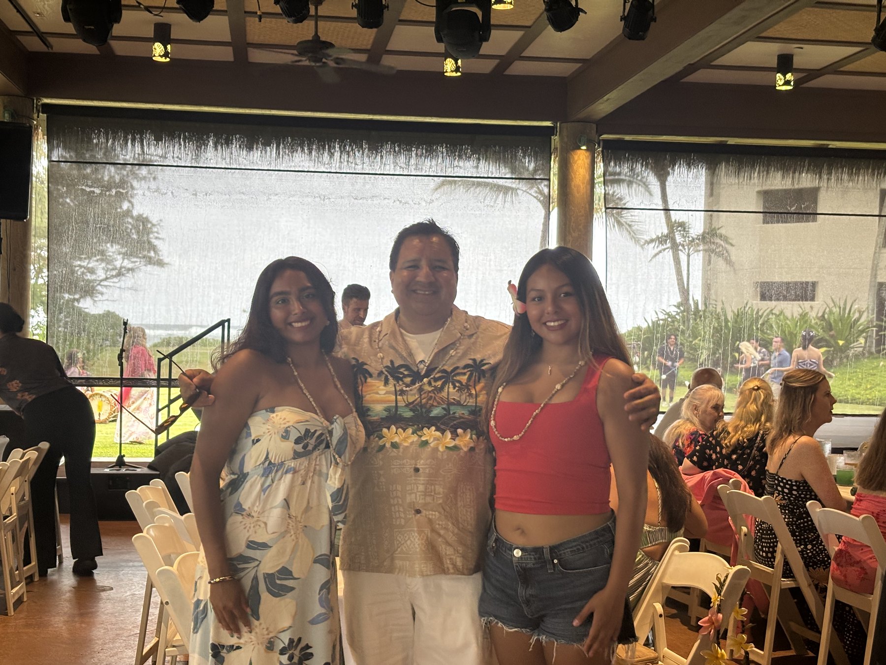 Raymond and family in Hawaiian attire