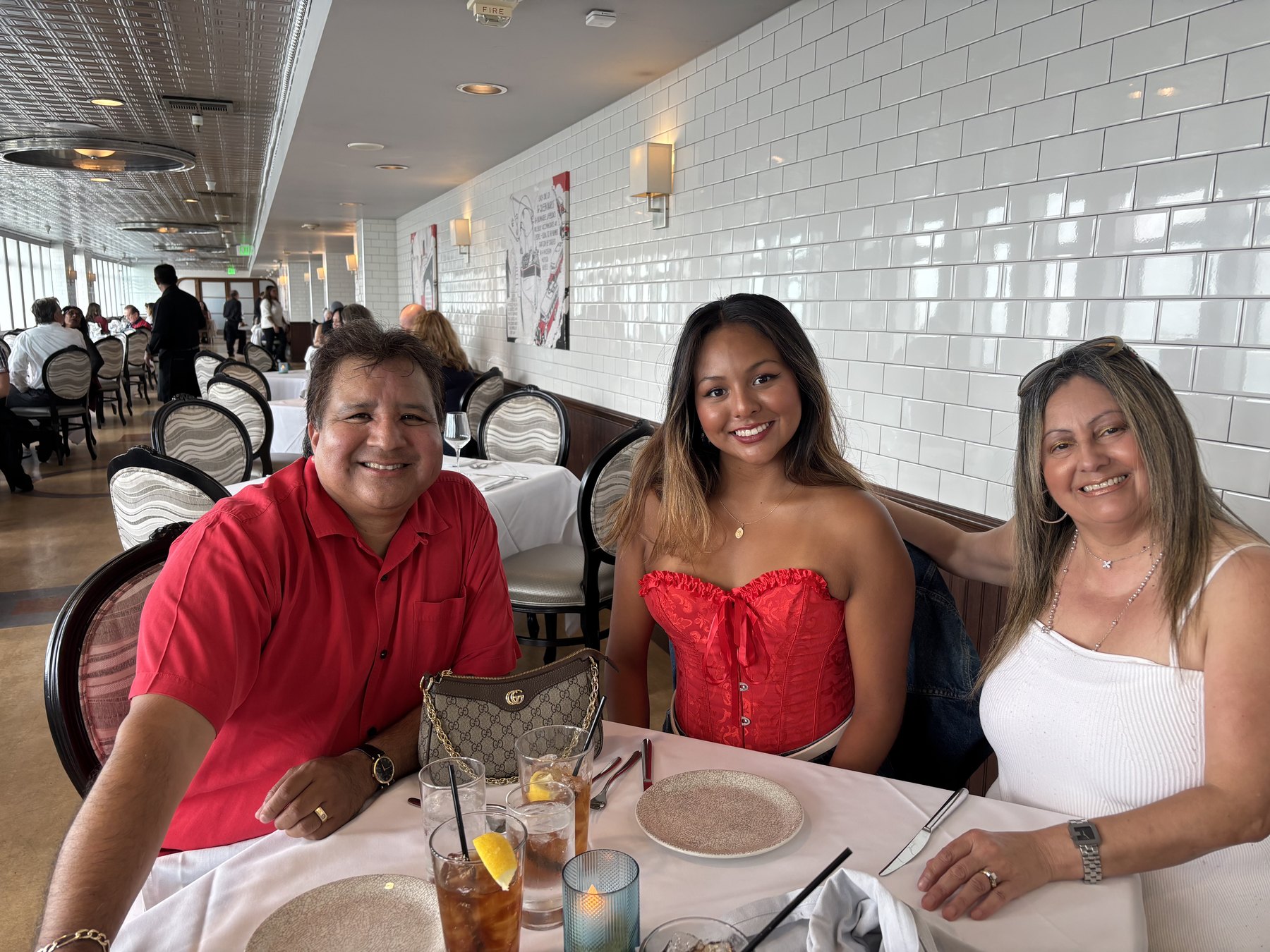 Raymond and family at indoor dining